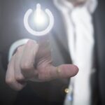 Man pushing on button to suggest turning on a thought.