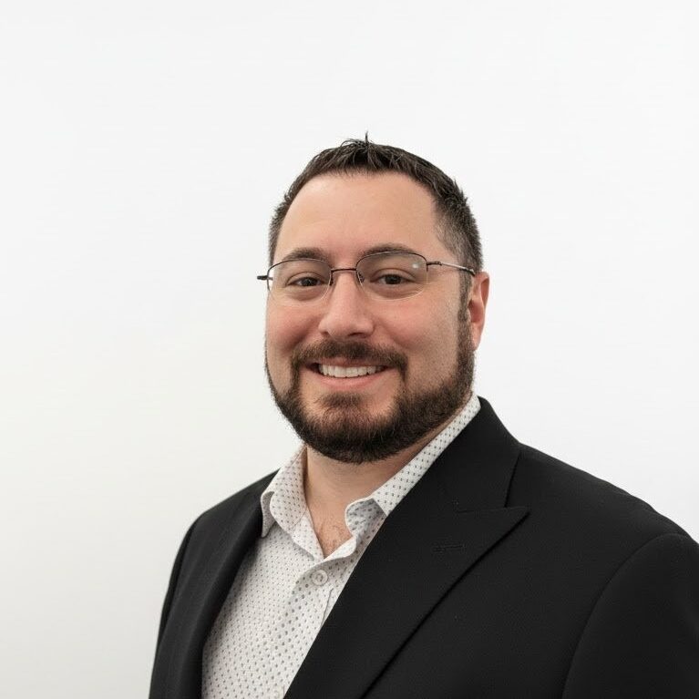 Photo of Chris in suit